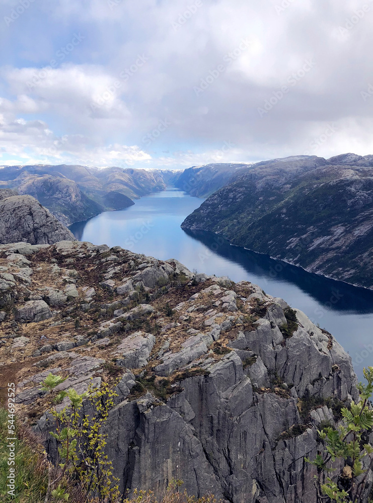 Vertical panoramic view of famous Norwegian fjord Lysefjord or Lysefjorden from top of Preikestolen or Pulpit rock. Most popular Norway tourist attractions. Norwegian sea landscape