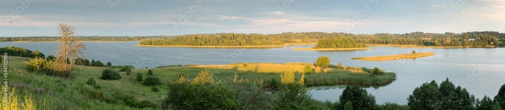 Serene landscape with a lake lake in the evening Serene landscape with a lake lake in the evening