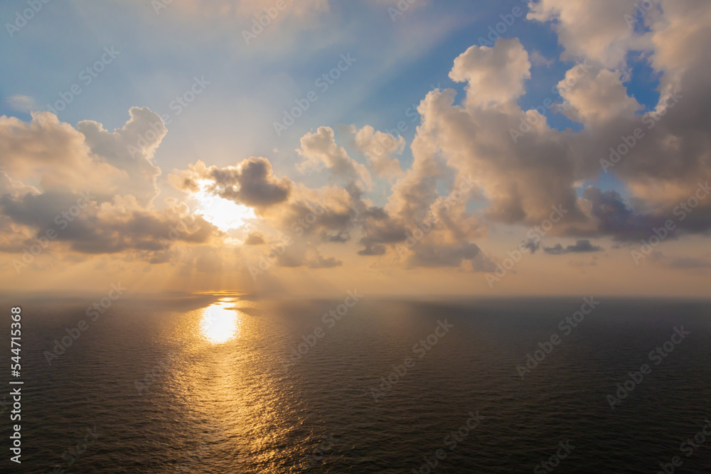 Sea. Sunset with beams