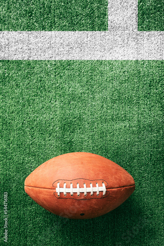 Sports: Football Sits On Field With Copyspace