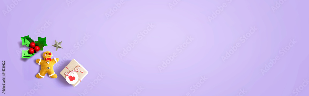 Fototapeta premium Small Christmas ornaments - overhead view flat lay