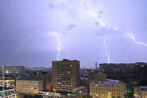 July 10, 2021. Moscow Russia. Lightning flashes in the sky over the city on a warm summer night in the Russian capital.