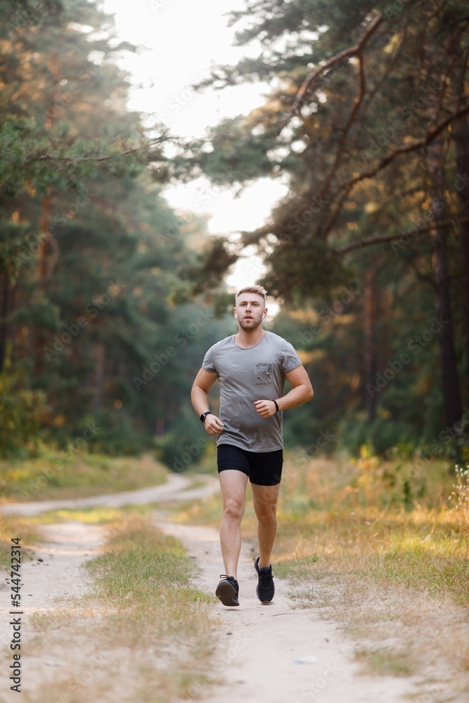 Man having run at forest