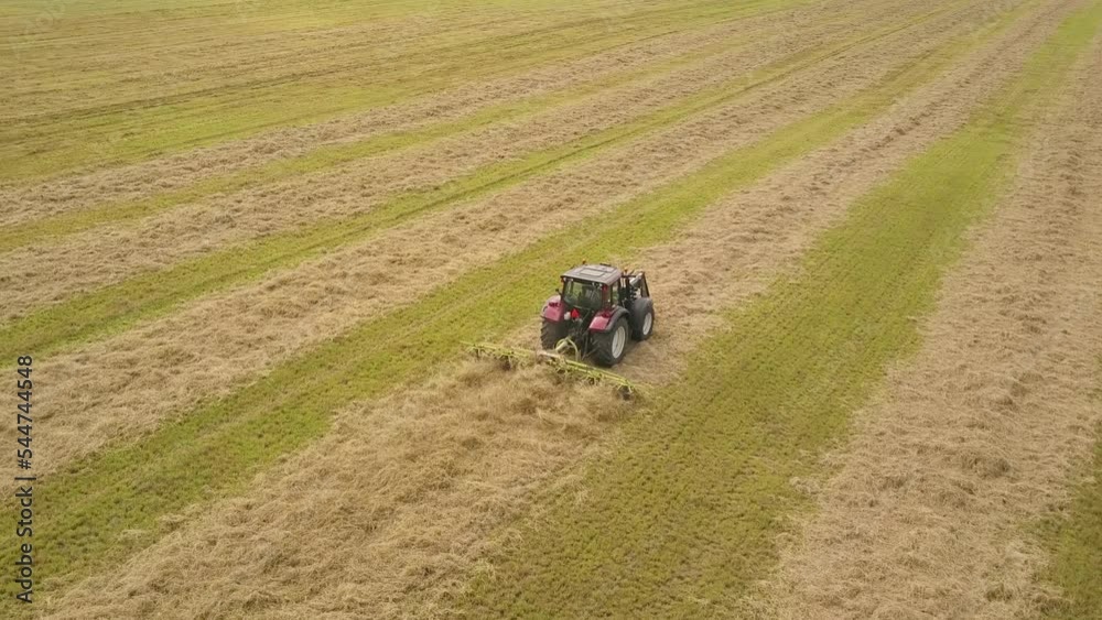 Tossing Hay to Get the Underside to Dry Better Aerial Tracking Stock