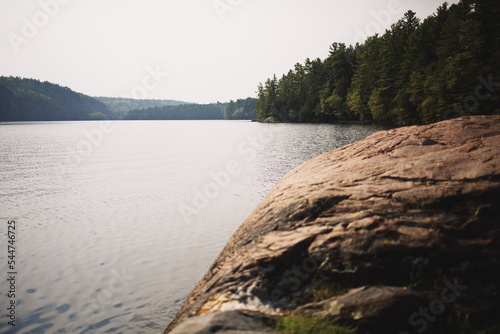 Bon Echo Provincial Park in Ontario, Canada. A spectacular landmark in North America alongside Mazinaw Lake. Autumn leaves and fall colors late in the season making for a beautiful landscape. photo