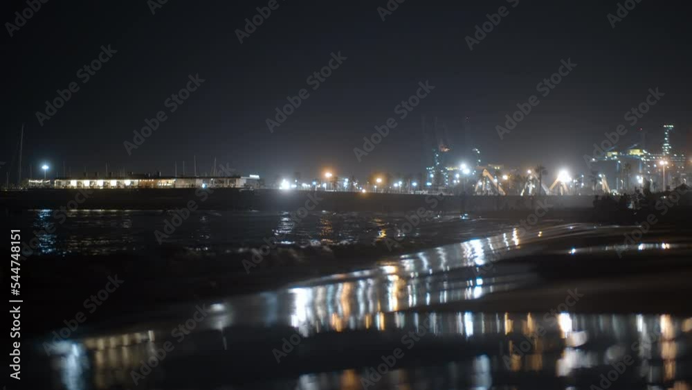 Night beach and urban lights in Valencia Night beach and urban lights in Valencia