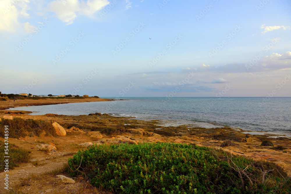 sunset in punta braccetto beach, ragusa, sicily, italy sunset in punta braccetto beach, ragusa, sicily, italy