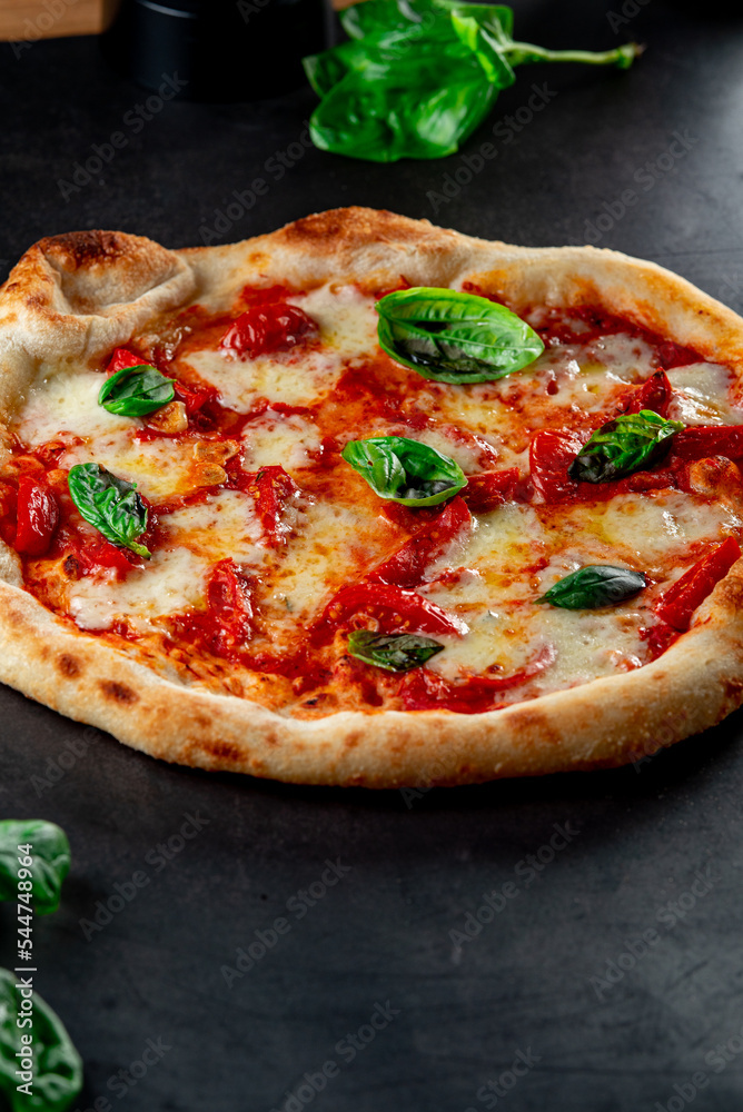 pizza with tomatoes and basil pizza with tomatoes and basil
