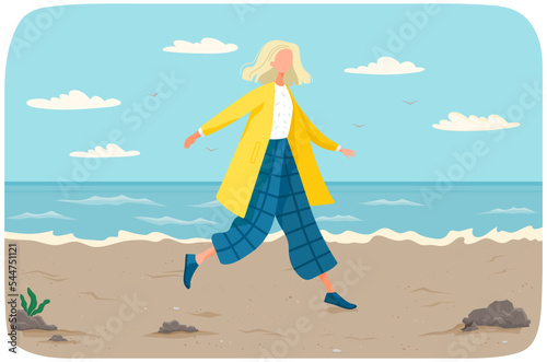 Happy girl walks along beach. Summer landscape in background with sand and water, outdoor activities. Woman running along seashore. Female at coast, seascape. Summertime, beach rest, vacation