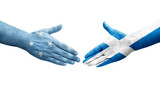 Handshake between Micronesia and Scotland flags painted on hands, isolated transparent image.
