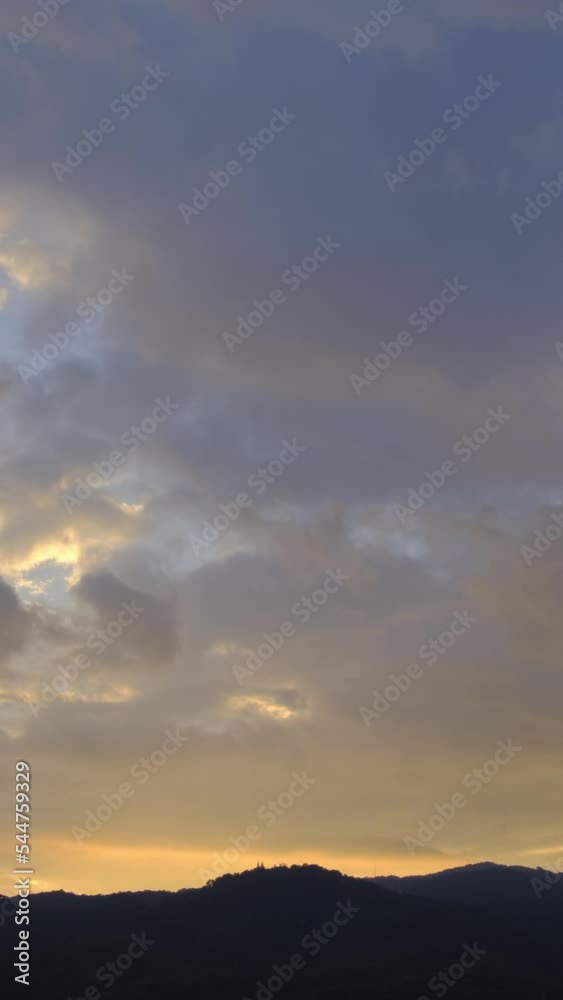 Twilight and dawn sky with cumulus cloud vertical time lapse in an evening. Twilight and dawn sky with cumulus cloud vertical time lapse in an evening.