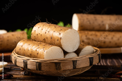 fresh Chinese yam on wooden table photo