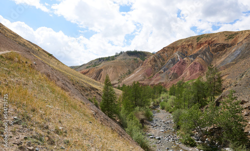 A multicolored eve with a parched mountain river, Mars 2. Nature of the Altai Mountains. © Vin.rusanov