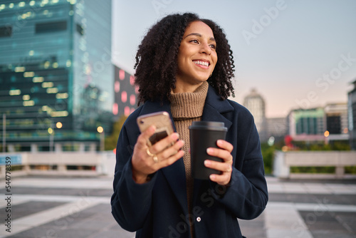 Canvas Print Coffee, phone or business woman travel in city, street or road with smile for communication, networking or social media news