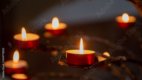 votive candles in iron candlestick