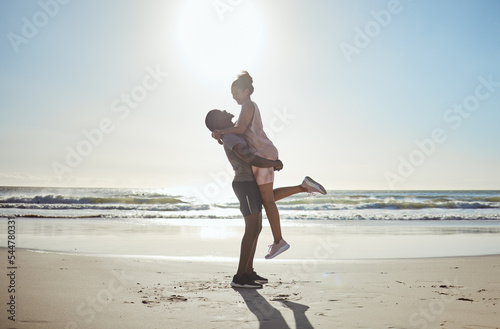 Couple, bonding or hug on beach date by water waves, sea or Bali ocean in romance holiday, anniversary vacation or proposal celebration. Smile, happy or fun black woman and man love bonding in nature