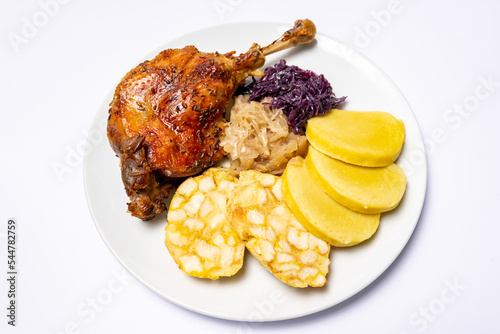 Roast duck, goose with dumplings and cabbage