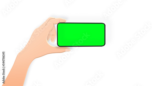 Business man hand shows mobile smartphone with green screen on green background.