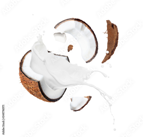 Crushed coconut with milk splashes in the air