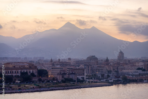 City on Mediterranean Coast with mountains in background in Palermo, Sicily, Italy. Sunset Sky. © edb3_16