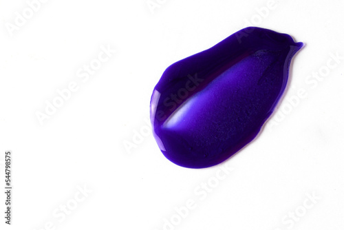 Purple hair shampoo smear on white background. Cooling shampoo or conditioner swatch