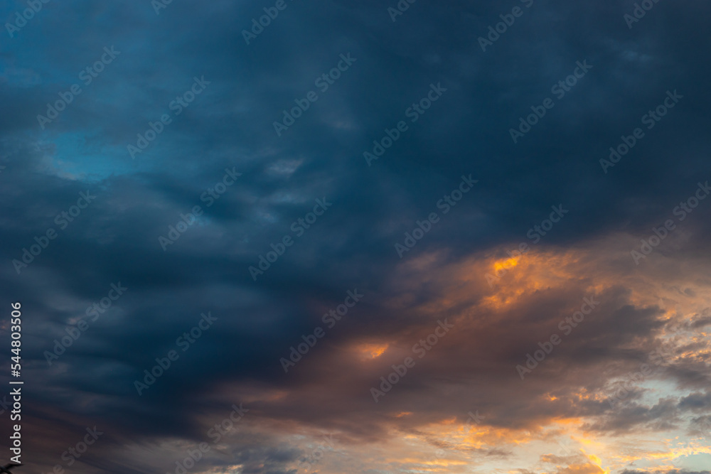 Partly cloudy sky at sunrise or sunset. Cloudscape in the morning