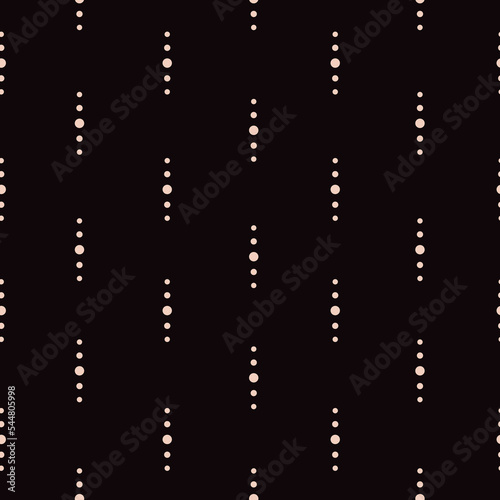 Dots are a vertical vector pattern. Dark neutral background