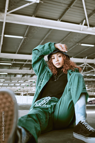 Canvas Print Portrait of black woman, relax and urban fashion, warehouse and modern style, cool in building