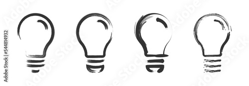 Grunge textured light bulb icon set.