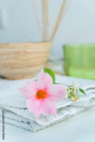 spa concept  fresh flowers and aroma diffuser