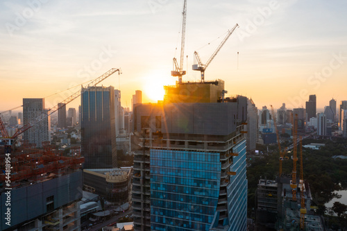 aerial view of construction site with tower crane urban construction Rush hour of concrete pouring 