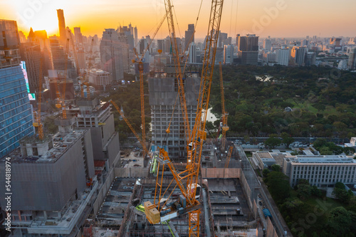 aerial view of construction site with tower crane urban construction Rush hour of concrete pouring 