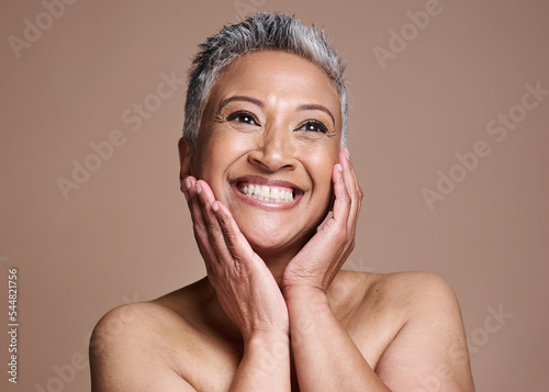 Quadro su tela Skincare, anti aging and portrait of mature woman with smile on her face on studio background