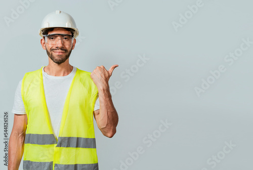 Obraz na plátně Portrait of engineer man pointing aside