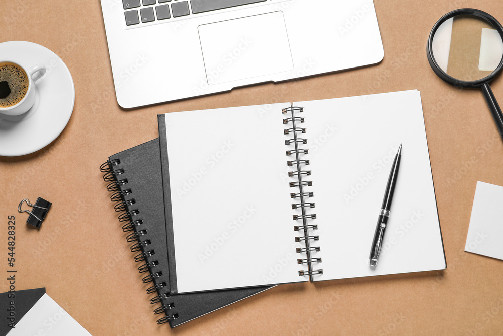 Flat lay composition with stylish notebooks on brown background Flat lay composition with stylish notebooks on brown background