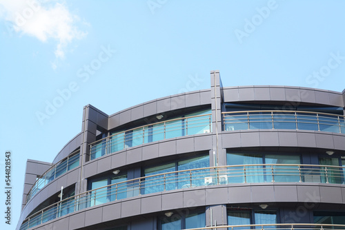 Foto Exterior of beautiful residential building with balconies, low angle view