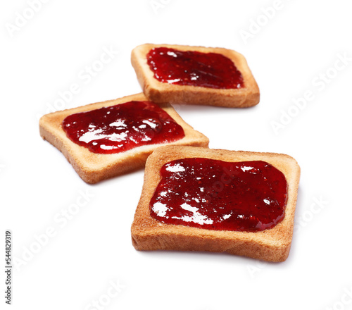 Delicious crispy toasts with berry jam on white background