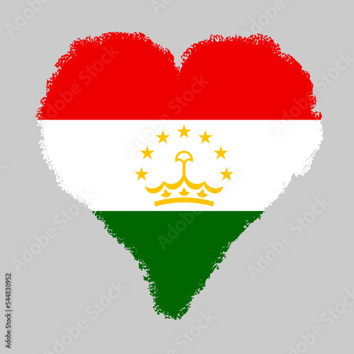 Tajikistan colorful flag in heart shape with brush stroke style isolated on grey background