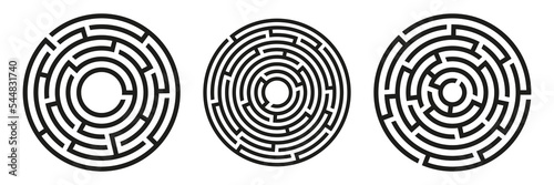Black circle vector mazes isolated on white background. Black labyrinths with one and three entrances. Vector maze icon. Labyrinth symbol. Circle puzzle photo