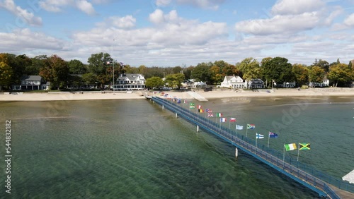 Aerial Drone View Of The Jetty With Waving Flags In Buffalo Canoe Club, Fort Erie, Canada. photo