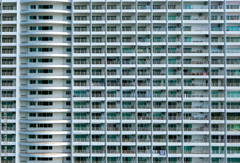 The white mansion block in the Pattaya beach of Thailand. Condominium for travelers, Residential with an outside and high view.