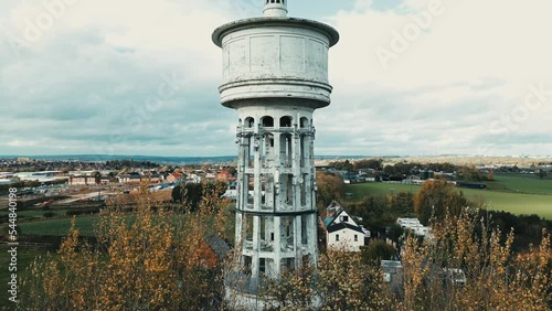 Aerial footage of Gawthorpe Water Tower from Chidswell Lane. The Gawthorpe Water Tower built in the 1920s made from concrete and painted white. Birdseye view photo