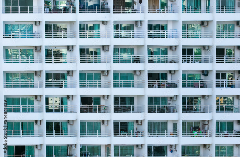 The white mansion block in the Pattaya beach of Thailand. Condominium for travelers, Residential with an outside and high view. The white mansion block in the Pattaya beach of Thailand. Condominium for travelers, Residential with an outside and high view.