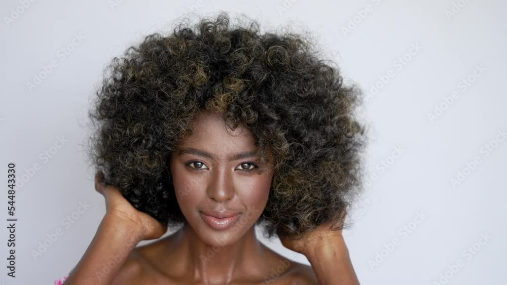 Smiling black woman with curly hair Smiling black woman with curly hair