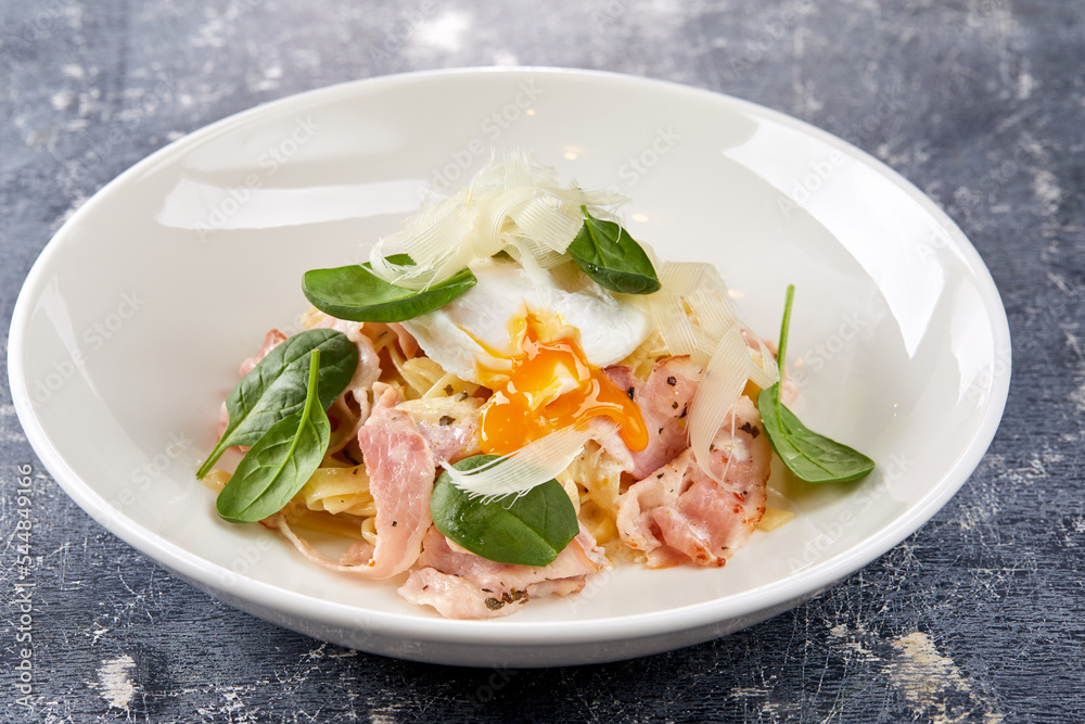 Carbonara pasta. Spaghetti with pancetta, egg, parmesan cheese and cream sauce Carbonara pasta. Spaghetti with pancetta, egg, parmesan cheese and cream sauce