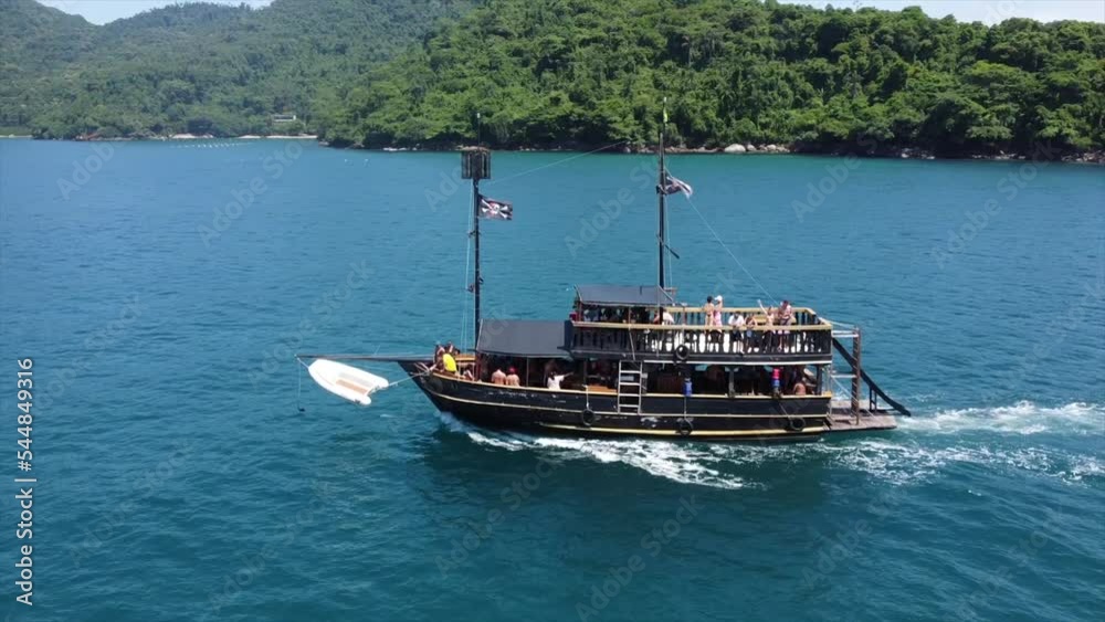 Pirate Ship Boat Tour in Brazilian Atlantic Ocean Surrounded by Islands. Highlighting Rear Water Slide.
Paraty, Brazil By Drone 4k
Aerial Nature + Travel Pirate Ship Boat Tour in Brazilian Atlantic Ocean Surrounded by Islands. Highlighting Rear Water Slide.
Paraty, Brazil By Drone 4k
Aerial Nature + Travel