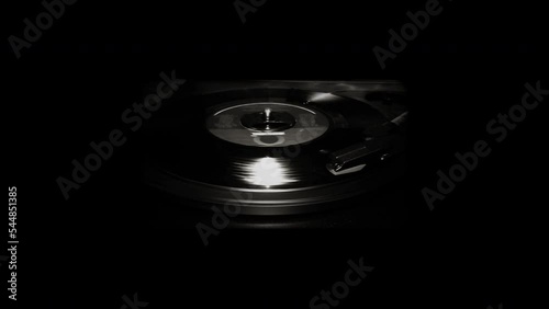 45 rpm record player with spinning record. photo