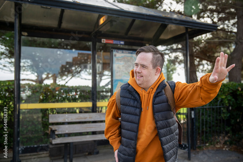 Fotografie Man waiting at bus stop