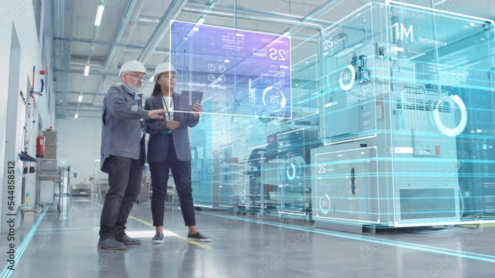 Factory Digitalization: Two Industrial Engineers Use Tablet Computer, Big Data Statistics Visualization, Optimization of High-Tech Electronics Facility. Industry 4.0 Machinery Manufacturing Products