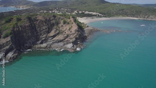 Cove Beach In Rocky Shore Of Butterfish Bay On Great Keppel Island In Central Queensland, Australia. Aerial Tilt-up photo